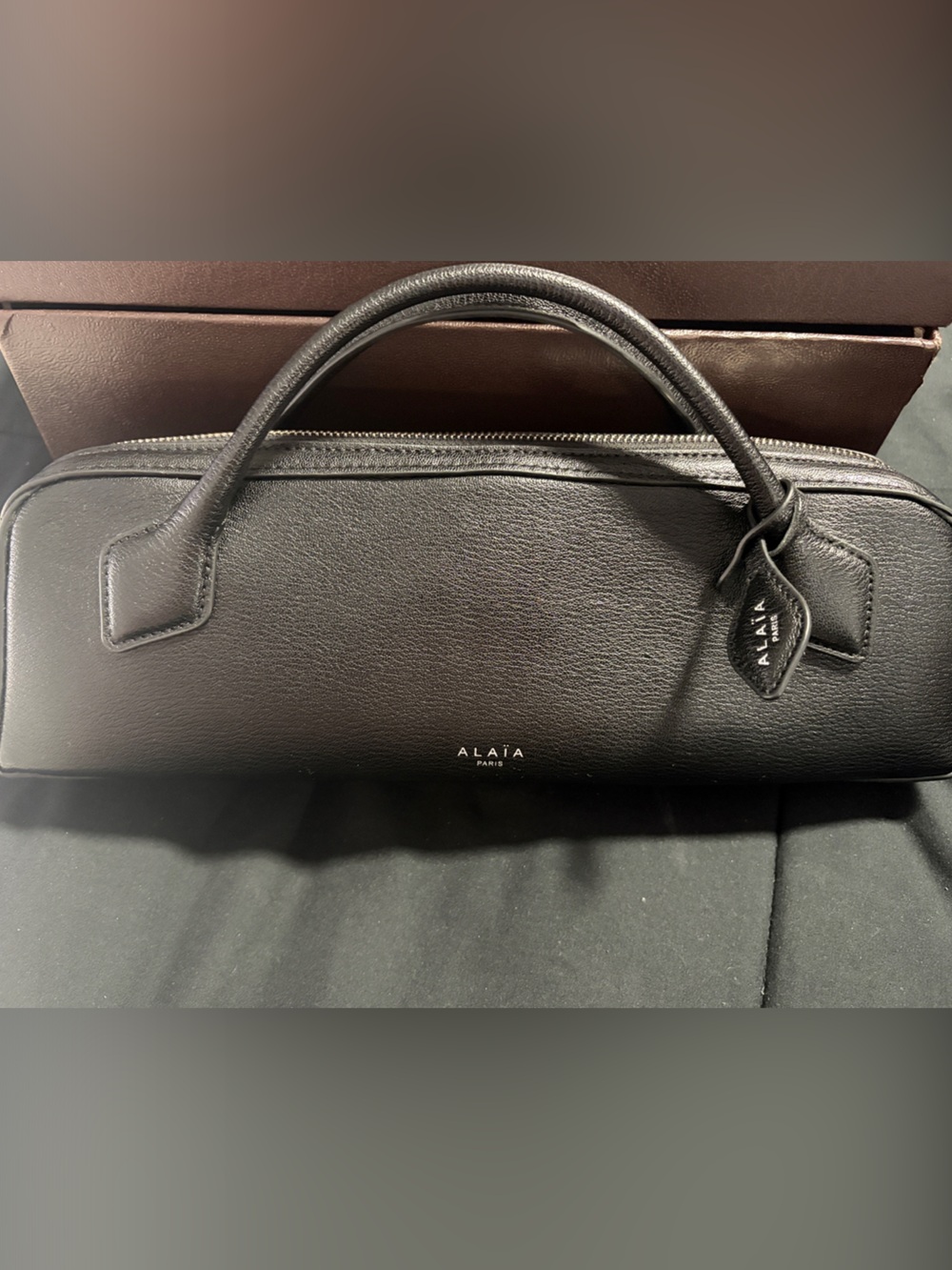 Alaia Le Teckel small leather clutch